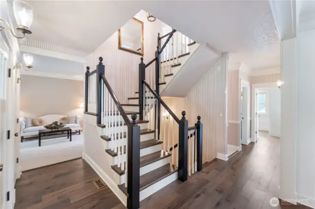 Beautiful staircase leads from the top to the lower level