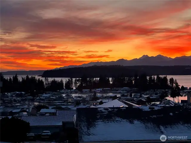 Epic sunsets of canal and Mountains overlooking the marina.