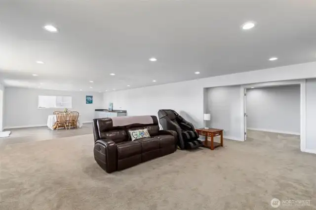 Downstairs entertainment area with wetbar.