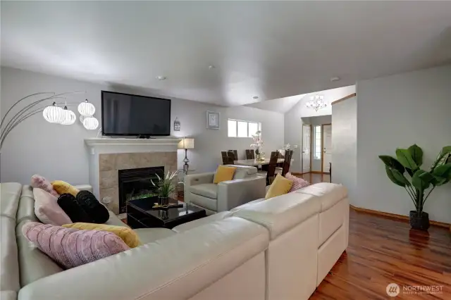 The living room is open to the kitchen, allowing you to cook while watching TV or interacting guests