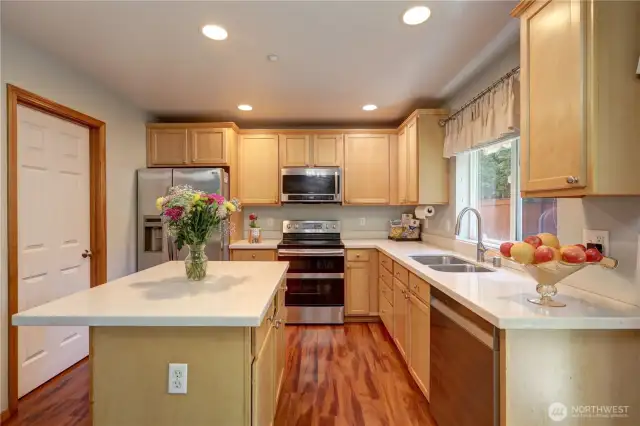 The kitchen is fully equipped with modern appliances and offers plenty of counter and cabinet space — perfect for cooking and hosting.