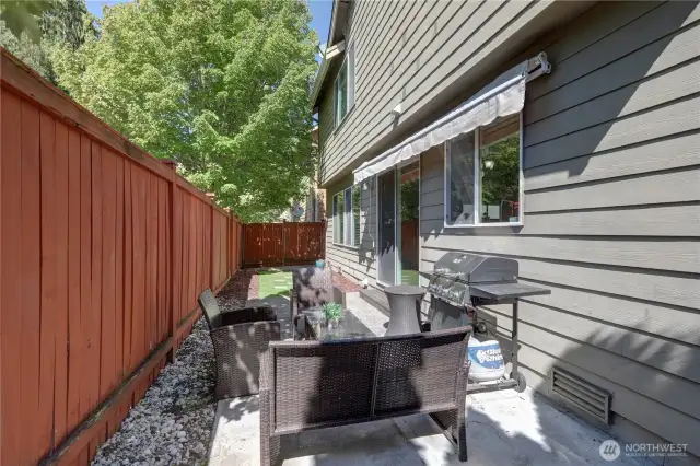 From the kitchen, you can access the patio door to your back patio
