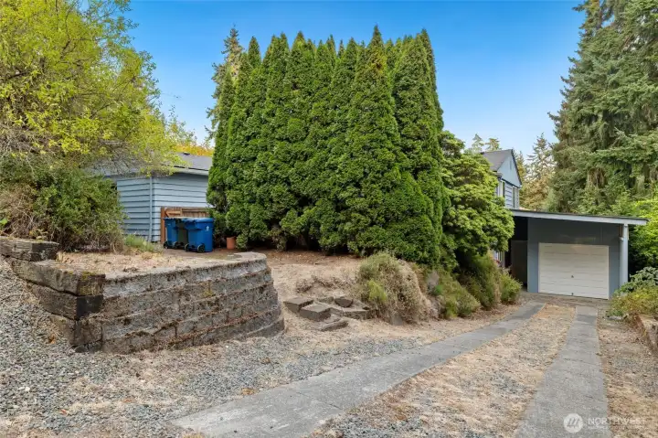 Separate Garage and Storage Shed plus terraced garden (not pictured to the right) and additional parking
