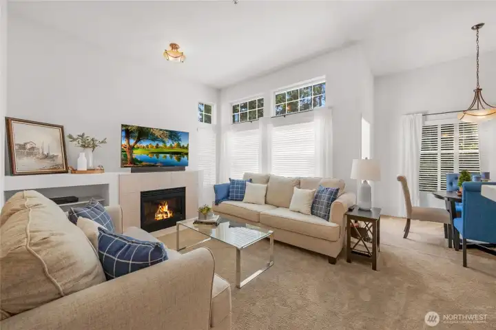 Light and bright top floor condo with soaring vaulted ceilings