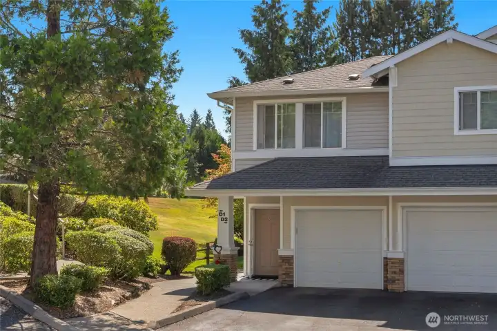 Charming exterior-the garage for this unit is the first on the left, it enters straight into the condo from the inside