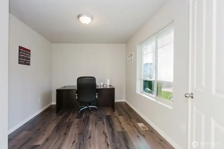 Den off of front entry