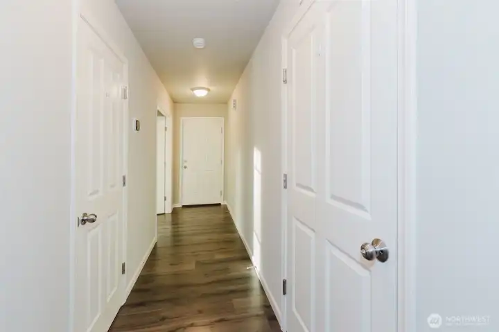 Front entry Hallway/ Garage Entrance-powder room- den