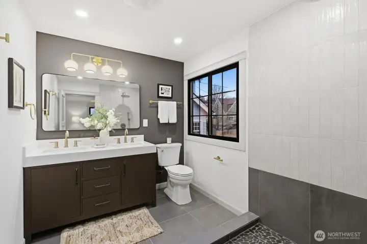 Primary Bathroom. As of photography day, the shower glass surround was waiting on delivery/installation. Shower glass is installed!!