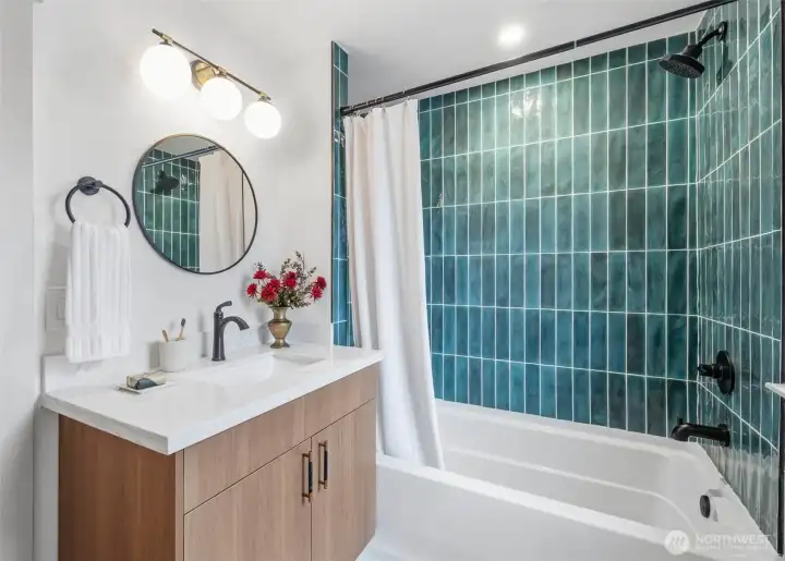 Main Floor full bath - half flight of stairs up from kitchen level.