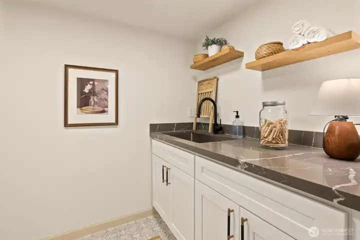 Lower Level laundry room - full size side by side W/D hookups on the left side (not shown in this photo).