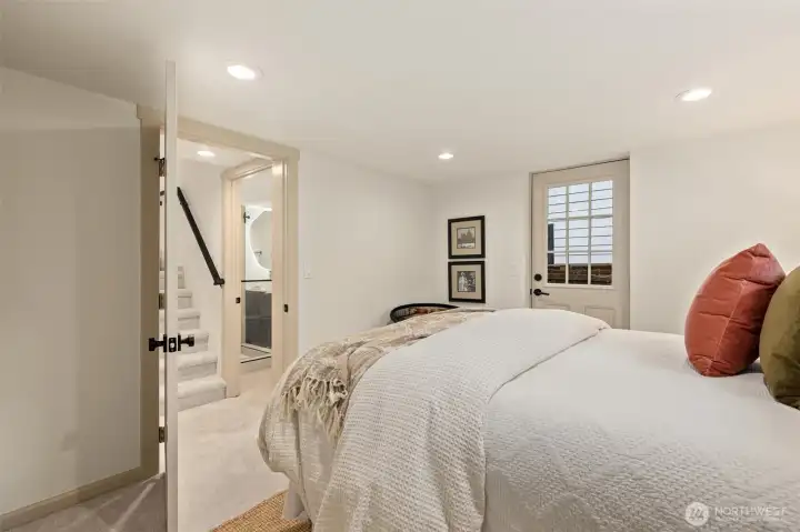 Lower Level bedroom with exterior access to backyard/sideyard.