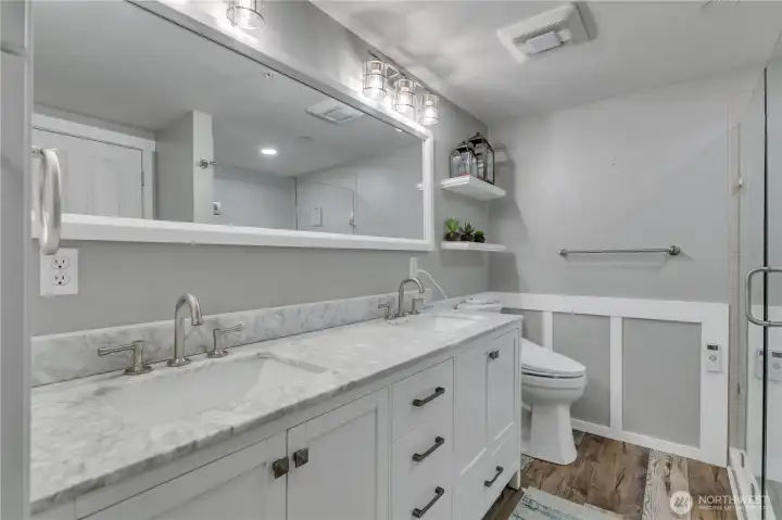 Upgraded Primary Bath with quartz countertops, updated vanity too and don't forget the bidet