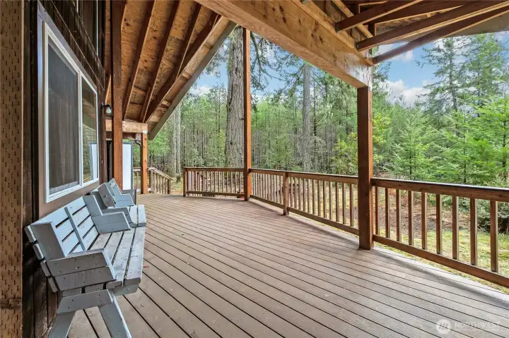 Sip coffee on covered deck and enjoy the fresh mountain air