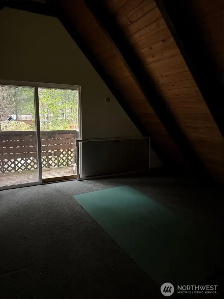 Loft area, w/ half bath & closet, slider out to small deck