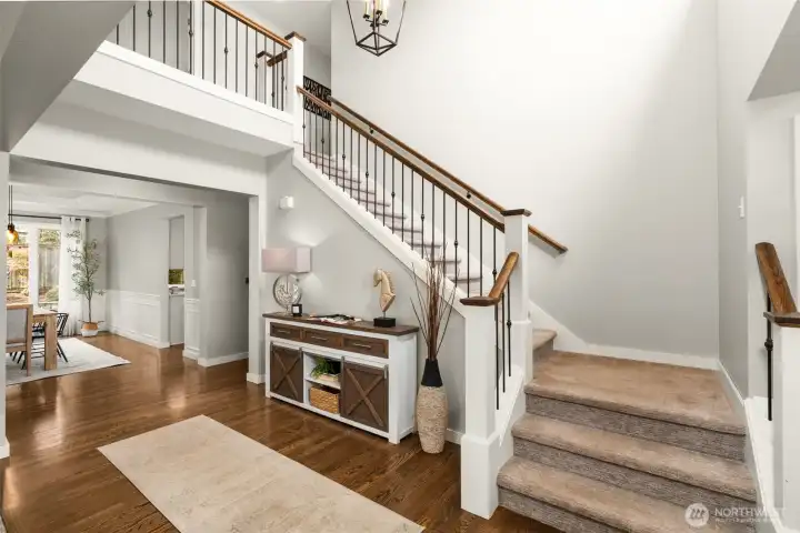 Memorable open foyer. Staircase to the upper level.