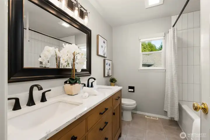 Updated upper level full bathroom.