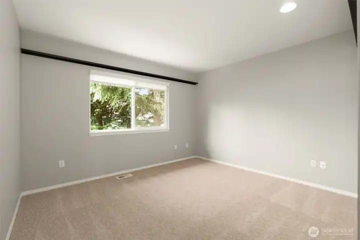 Second upper level bedroom. Shelving stays.