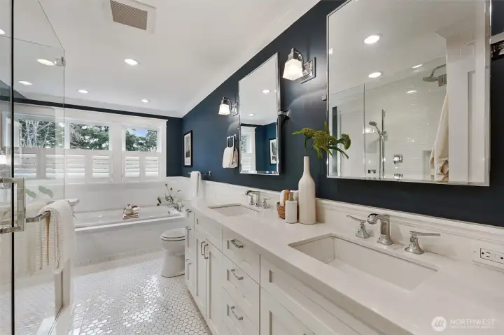 Every day is a spa day in this show-stopping bathroom! Dual sinks with Hansgrohe faucets and tons of storage below.