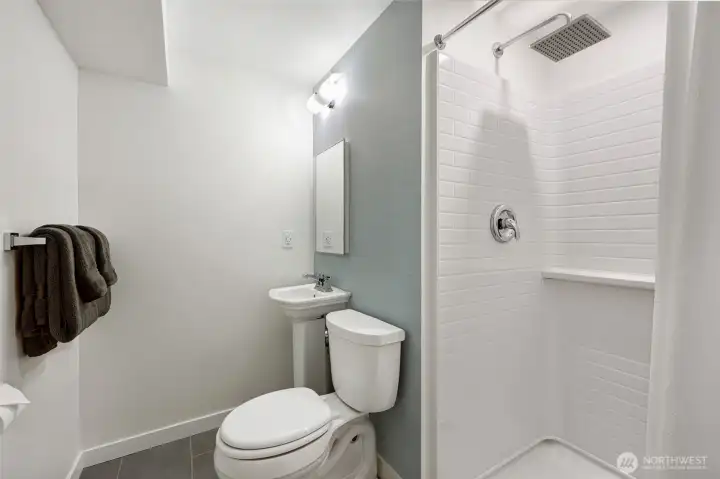 3/4 bathroom on the lower level is also near the garage entry  - ideal for you or Fido coming home from a muddy hike or summer day at nearby Richmond Beach.
