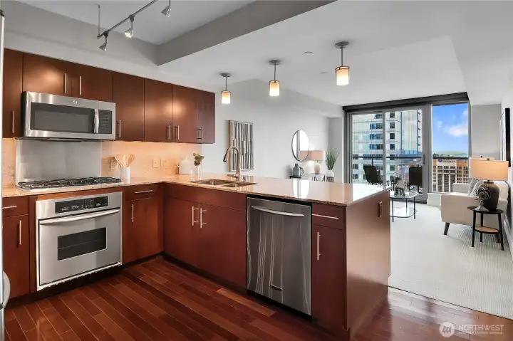 The kitchen dining bar is long and deep, and is a good place to sit and visit.