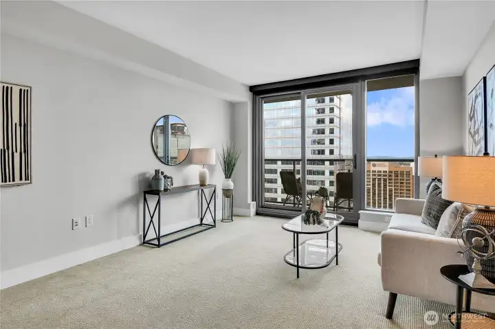 A covered deck that faces north offers panoramic views to the north, east and west of the beautiful city, the Mountain Ranges and Lake Washington!