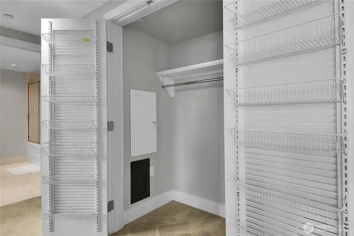 The big double door closet in the hallway has lots of room for storage, plus organizers on both doors.