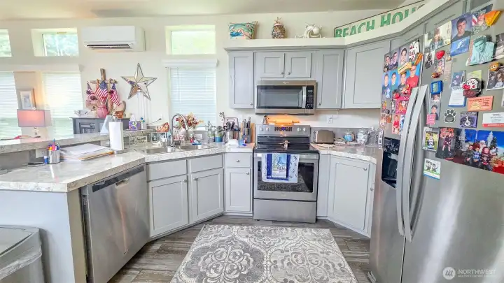 Plenty of counter space and cupboards.  A newly installed mini split unit keeps the home very efficient and cozy.