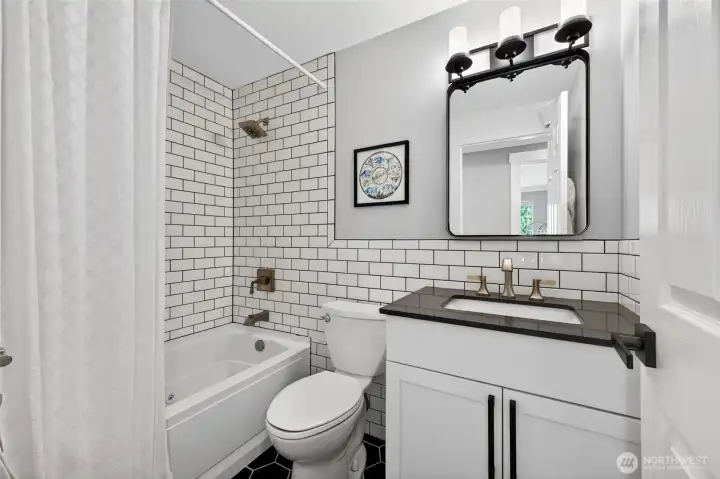 Updated bathroom with jetted bathtub