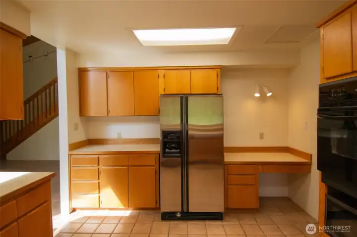 Large kitchen with built in desk