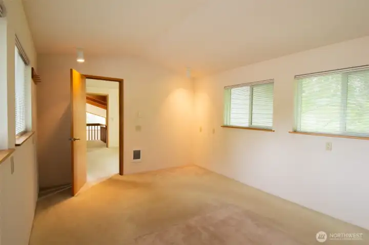 Bonus Room off of Primary is a great flex room for office, craft room, workout room, you name it!