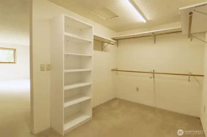 Walk-in Primary Closet with Built In Shelves