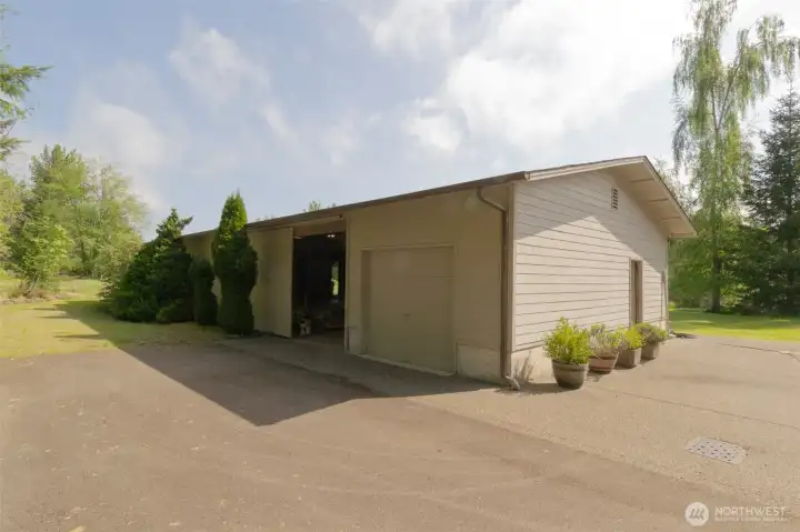 One overhead garage door and three 10-foot sliding doors.