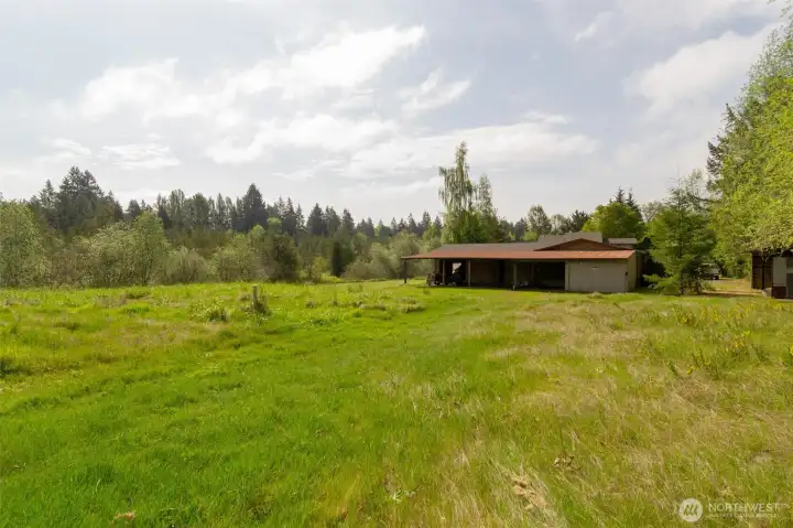 View from back of property drain-field looking at 2800 sf ft shop.