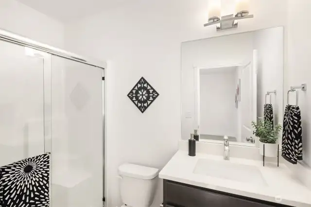 *All interior photos are from 9935 - mirrored floorplan.* First floor bathroom