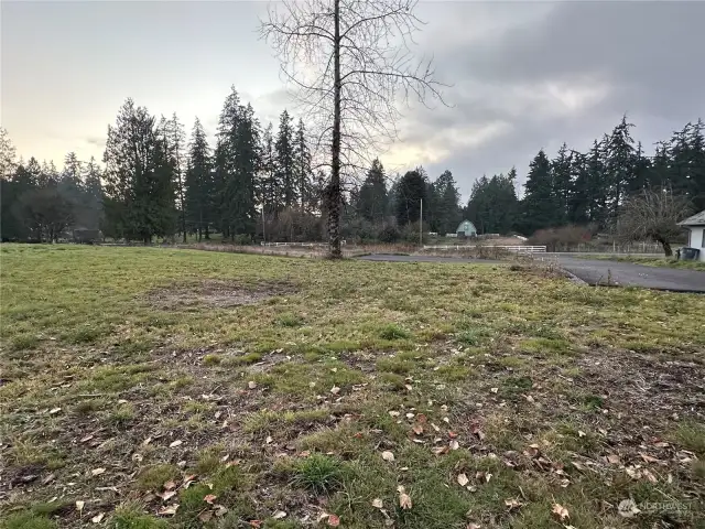 Lot looking west towards 114th. Visible on the right is the new paved shared access.