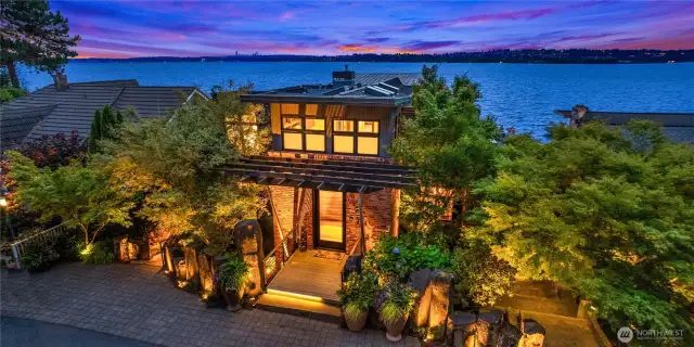 Truly magnificent West of Market waterfront estate with exceptional panoramic Southwesterly views of Lake Washington, the Seattle skyline, Olympic Mountains, rose colored sunsets, and maritime performances from nearly every room.