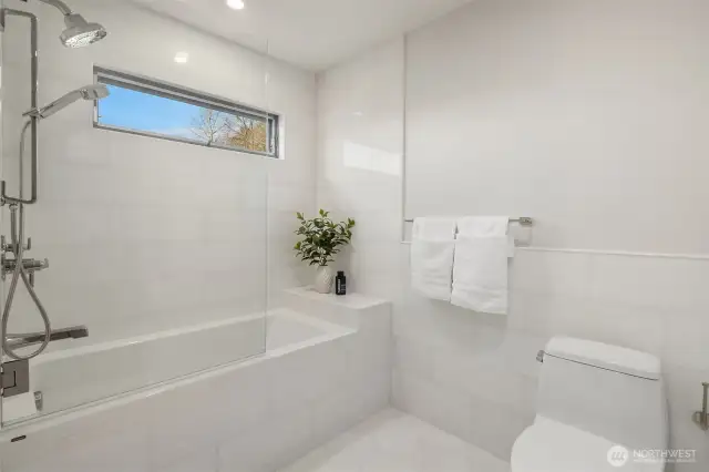Hydronic in-floor heat in all baths.