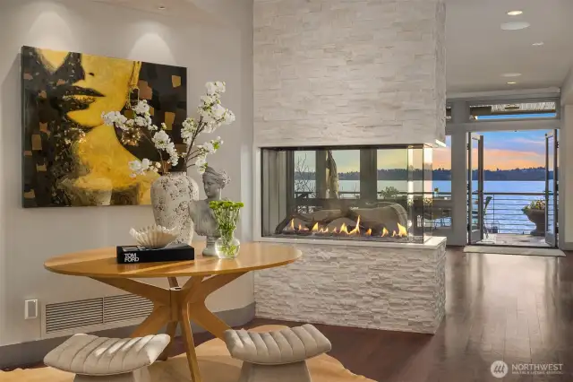 One of the finest estate style waterfront properties in all of Kirkland.Custom contemporary masterpiece on over one-half acre features high-end steel and concrete construction and artistic, professionally designed fixtures and finishes.