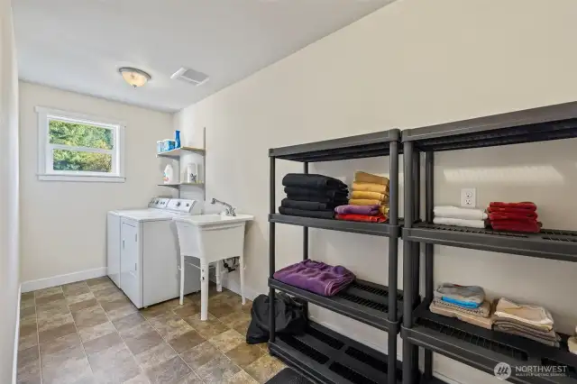 Laundry- conveniently located down the hall from the bedrooms.
