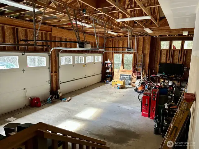 Massive garage! Can fit a small rv in addition to cars. Plenty of room to create a workshop as well.