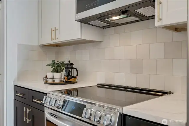 Gleaming appliances and designer tile set the tone for this hidden gem of a condo in the heart of downtown Bellevue.