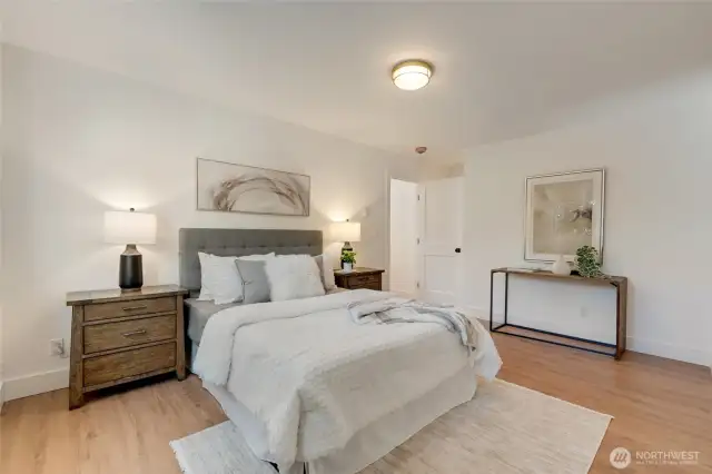 Plenty of room in this spacious primary suite complete with a full bath, dual closets, and private linen closet for extra storage.