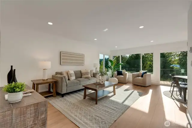 This spectacular spacious light flooded living space is open and bright with territorial views and rich greenery out of every new window!  Including triple pane and huge open slider for indoor outdoor feel.