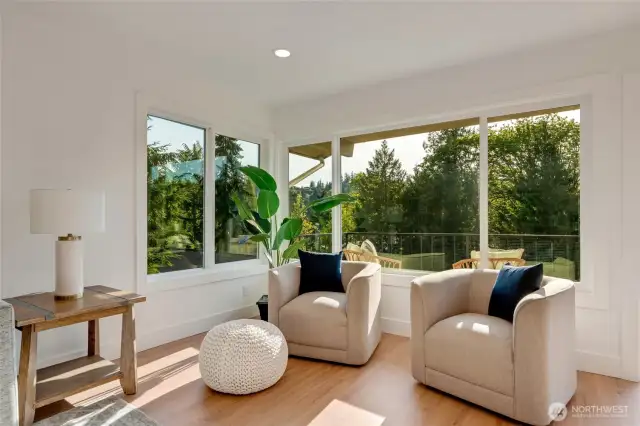 This perfectly appointed corner space is open to the outdoors through the triple pane windows letting all the natural light in and the keeping all the hustle and bustle out! Serene setting and nature surround!