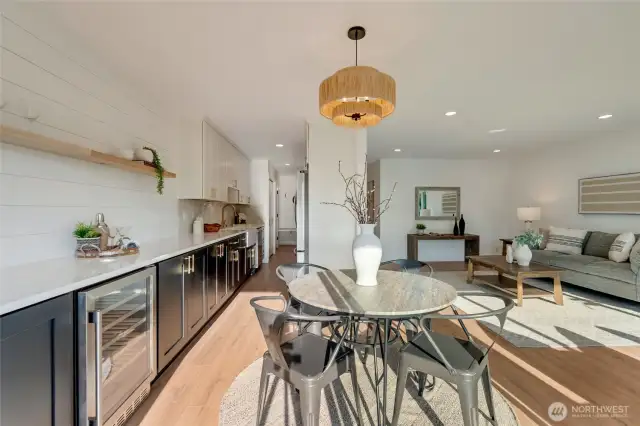 Have you ever seen a prettier condo kitchen space in downtown Bellevue for under $1 million? We didn't think so, come see how we were able to enlarge this kitchen and expand it into a new bar complete with a wine fridge, accent wall and floating shelves.