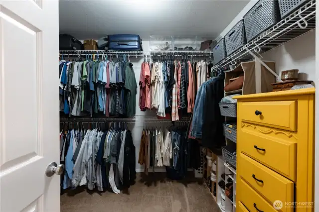 Primary bedroom walk-in closet.