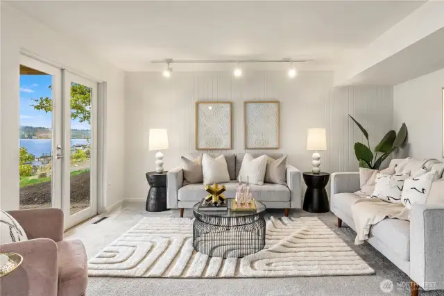 The family room on the lower floor is spacious and bright. Did I mention the lake view?