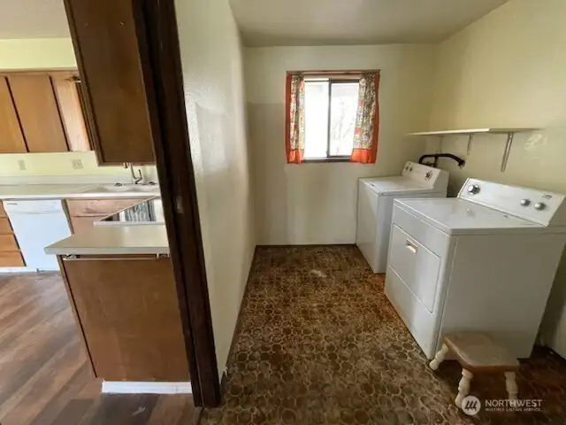 Utility room next to kitchen
