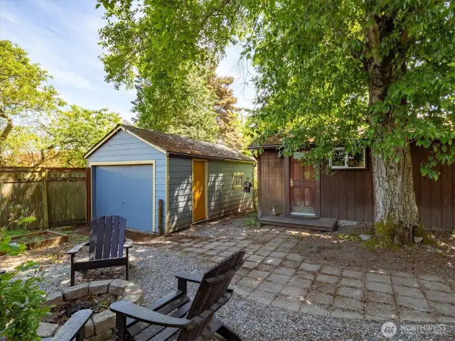 Large detached garage off alley (left) and DADU/Cottage (right)