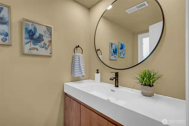 Completely remodeled half bath on the lower level